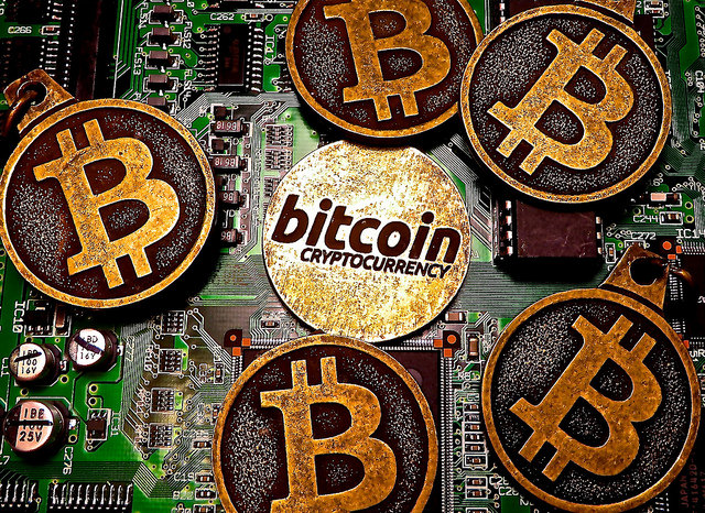 Bitcoin keychains on circuit board (Image: BTC Keychain)