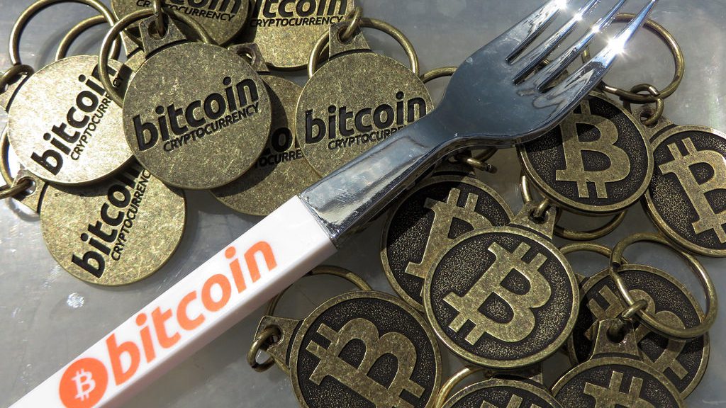 Bitcoin fork pen and bitcoin keychains (Image: BTC Keychain/Flickr)
