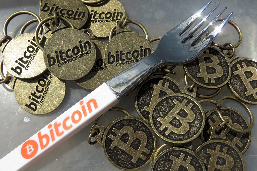 Bitcoin fork pen and bitcoin keychains (Image: BTC Keychain/Flickr)